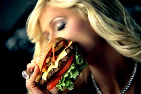 Paris Hilton bites into a Carl's Jr. Burger