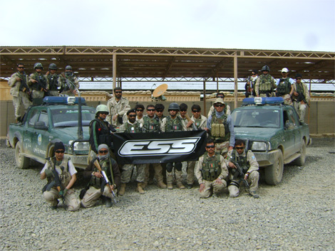 Afghan Police/soldiers (the good guys) with a banner of ESS.
