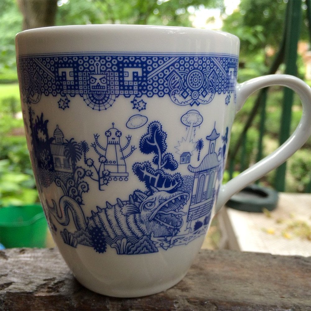 These mugs by Don Moyer replicate a traditional Blue Willow pattern but wit...